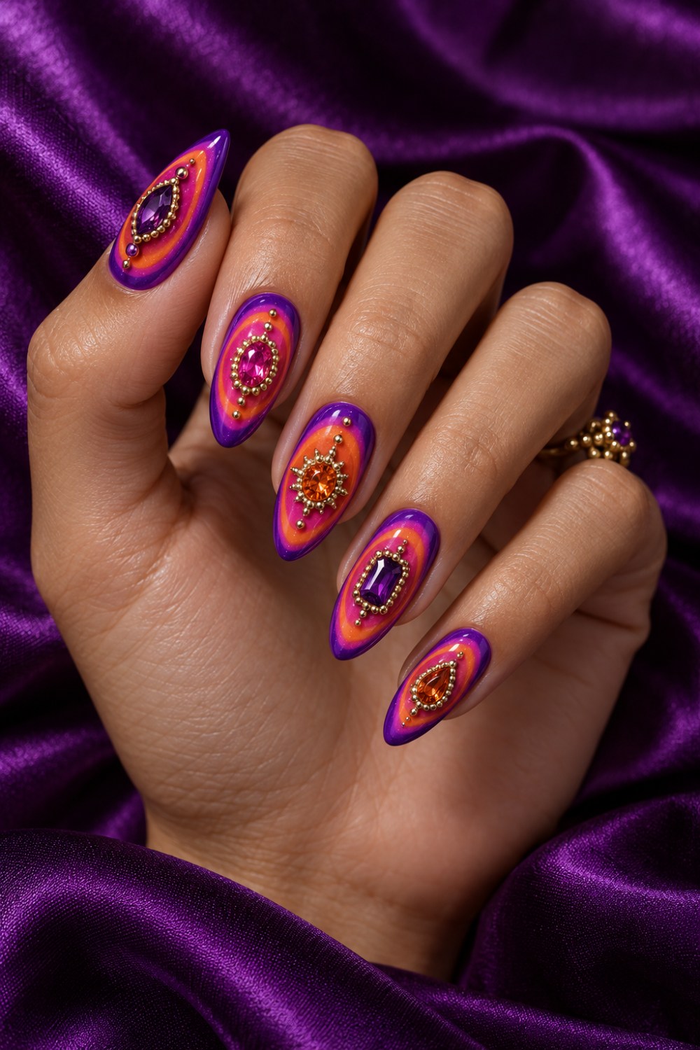 Violet, fuchsia and orange aura blends with faceted stones.