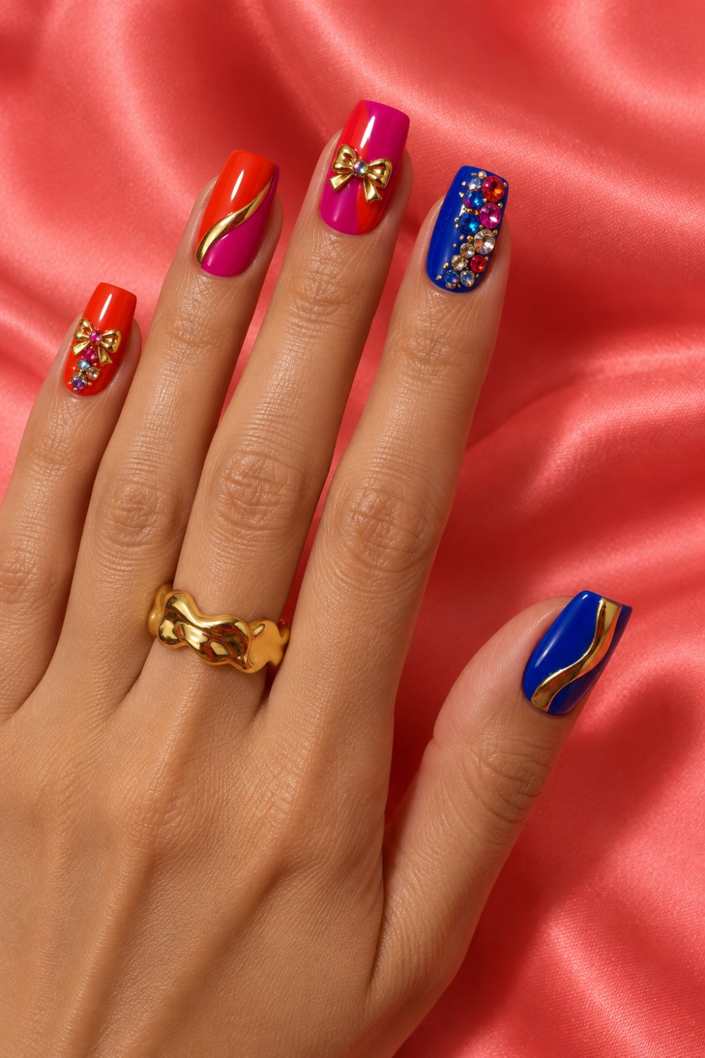 Coral, fuchsia and cobalt chrome with bows and crystals.