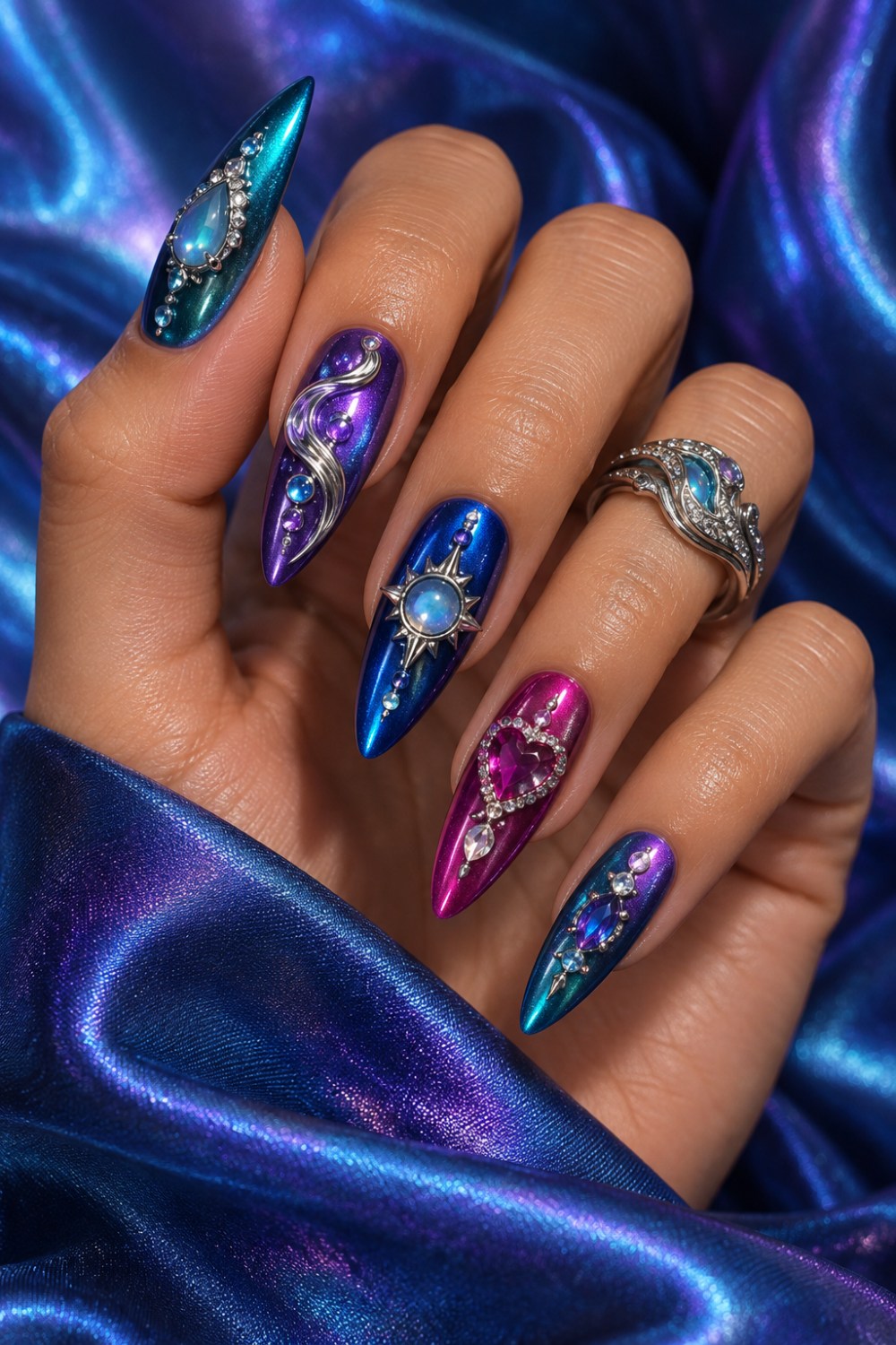 Teal, violet, cobalt and pink with silver waves and faceted gems.